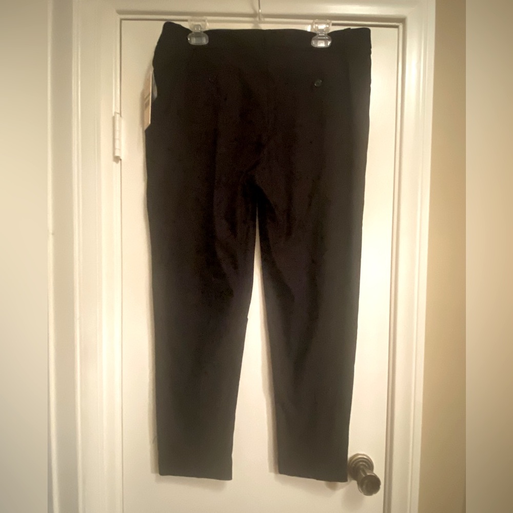 Brand new classy pants with double hook closure and button inside.